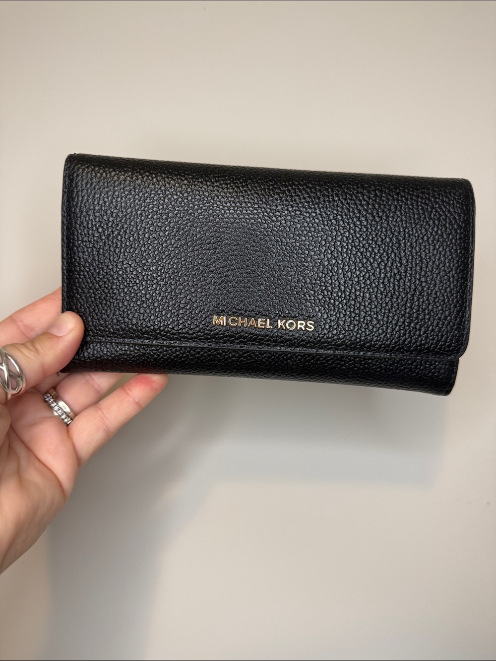 Michael Kors Black Pebbled Leather Flap Wallet with Gold Logo